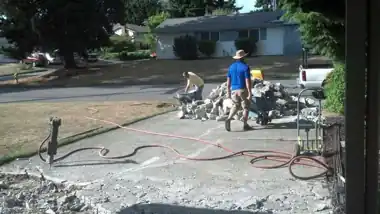 Driveway Tear-Out & Replacement in Bellevue, WA: concrete driveway work by Redmond Concrete (photo 2 of 6)