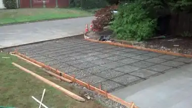 Redmond Concrete crew finishing a new driveway in Bellevue, WA