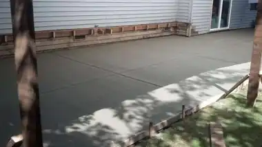 Large Backyard Patio in Bothell, WA by Redmond Concrete