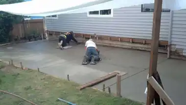 Large Backyard Patio in Bothell, WA: concrete patio and wall work by Redmond Concrete (photo 4 of 6)