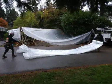 Tented Rainy-Season Driveway Pour: concrete driveway work by Redmond Concrete, concrete contractor serving Bothell (photo 2 of 5)