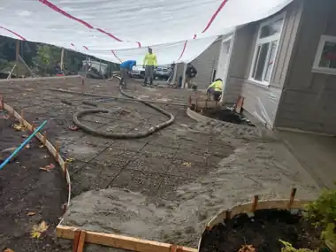 Tented Rainy-Season Driveway Pour: concrete driveway work by Redmond Concrete, concrete contractor serving Redmond (photo 4 of 5)