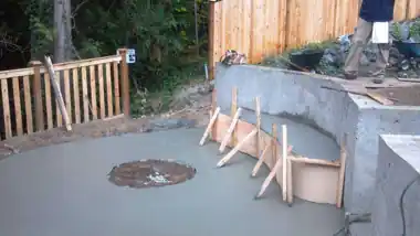 Radius Retaining Wall, Patio & Fire Pit in Bothell, WA by Redmond Concrete
