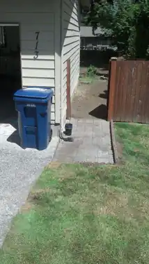 Side Walkway & Utility Pad in Bothell, WA: concrete walkway and steps work by Redmond Concrete (photo 2 of 6)