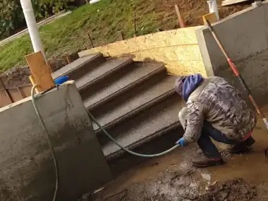 Another Firefighter’s Exposed Aggregate Patio & Round Steps in Bothell, WA: concrete patio and wall work by Redmond Concrete (photo 3 of 9)