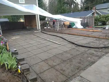 Stamped Patio & Broom-Finish Slab: concrete patio and wall work by Redmond Concrete, concrete contractor serving Woodinville (photo 3 of 5)