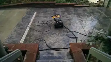 Stamped Patio & Brick Steps by Redmond Concrete, Puget Sound area
