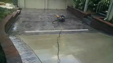 Stamped Patio & Brick Steps: concrete patio and wall work by Redmond Concrete, concrete contractor serving Kirkland (photo 3 of 3)