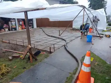 Tented Driveway Pour: concrete driveway work by Redmond Concrete, concrete contractor serving Kirkland (photo 2 of 4)