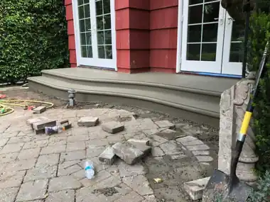 Wide Curved Steps over Pavers: concrete patio and wall work by Redmond Concrete, concrete contractor serving Bothell (photo 2 of 2)